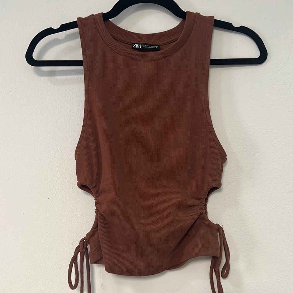 Side cutout tank